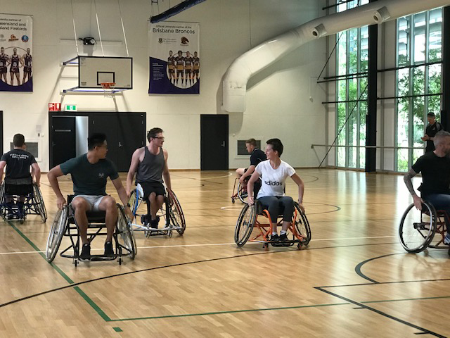 Sporting Wheeles athletes playing wheelchair basketball