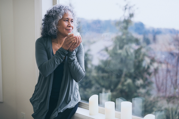 woman drinking a cup of coffee