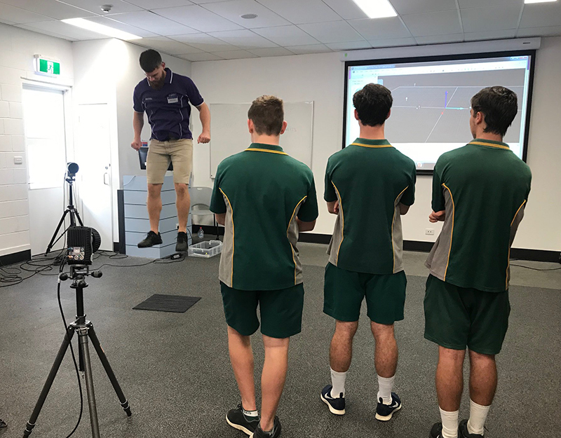 students watching biomechanics demonstration