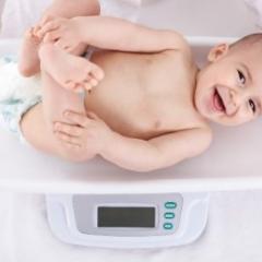 baby being weighed